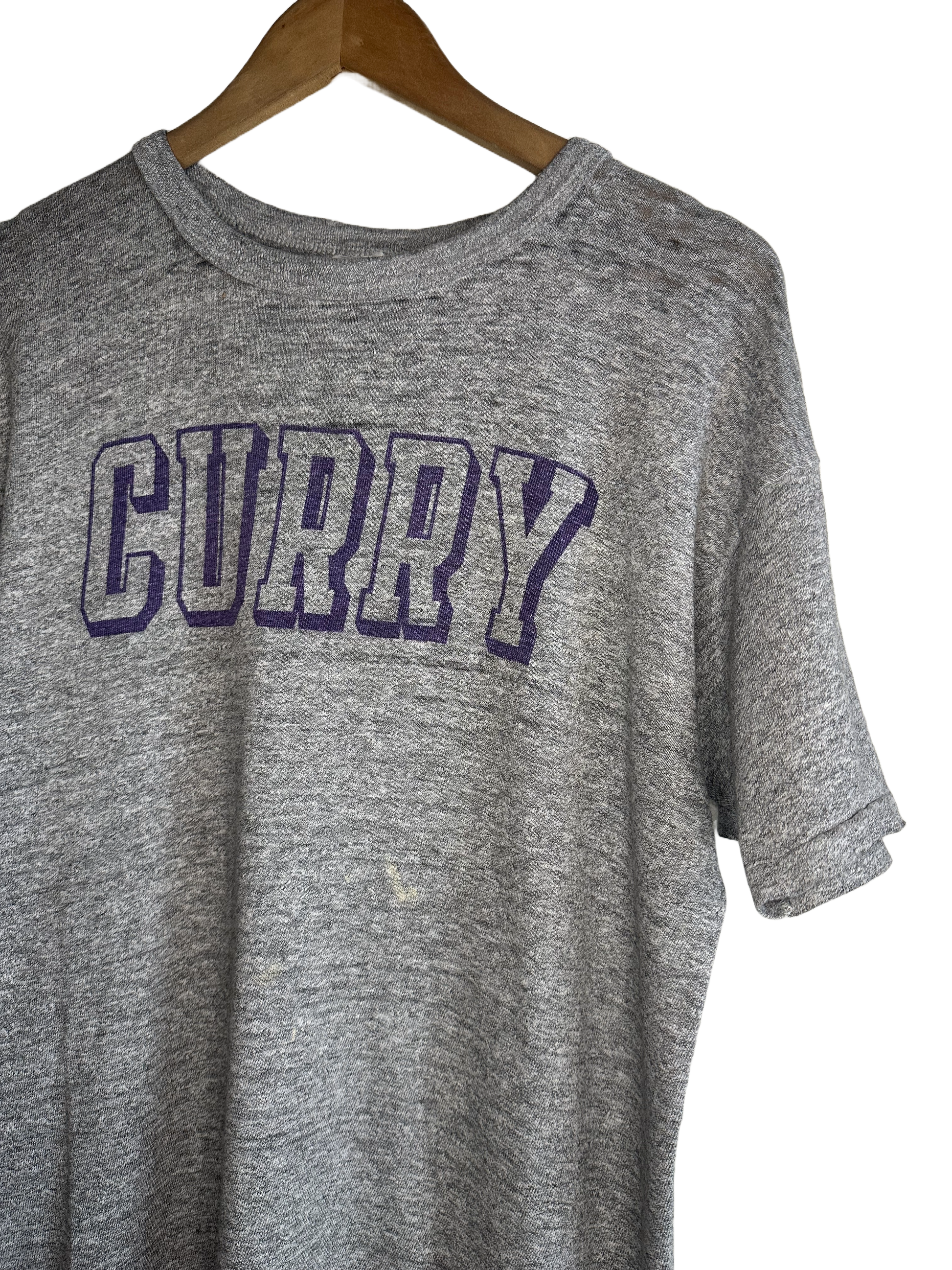 side view of logo curry - purple outline 