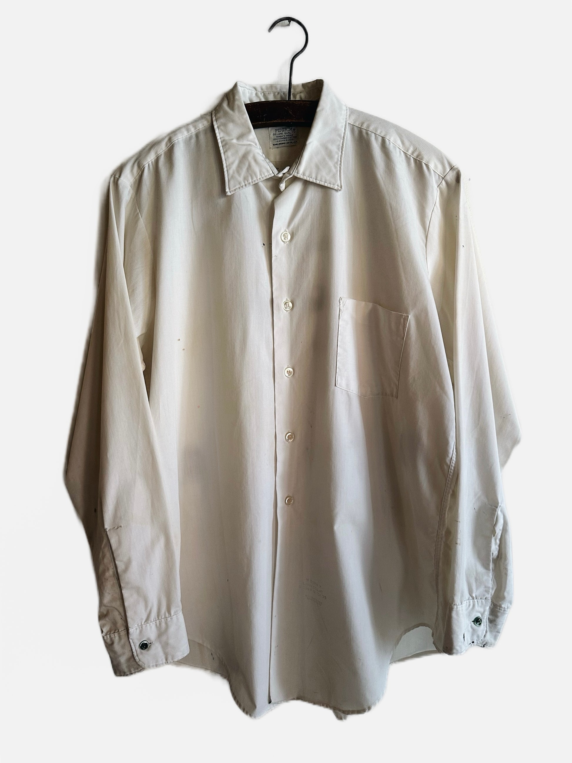front view of shirt with single pocket and buttons for closure 