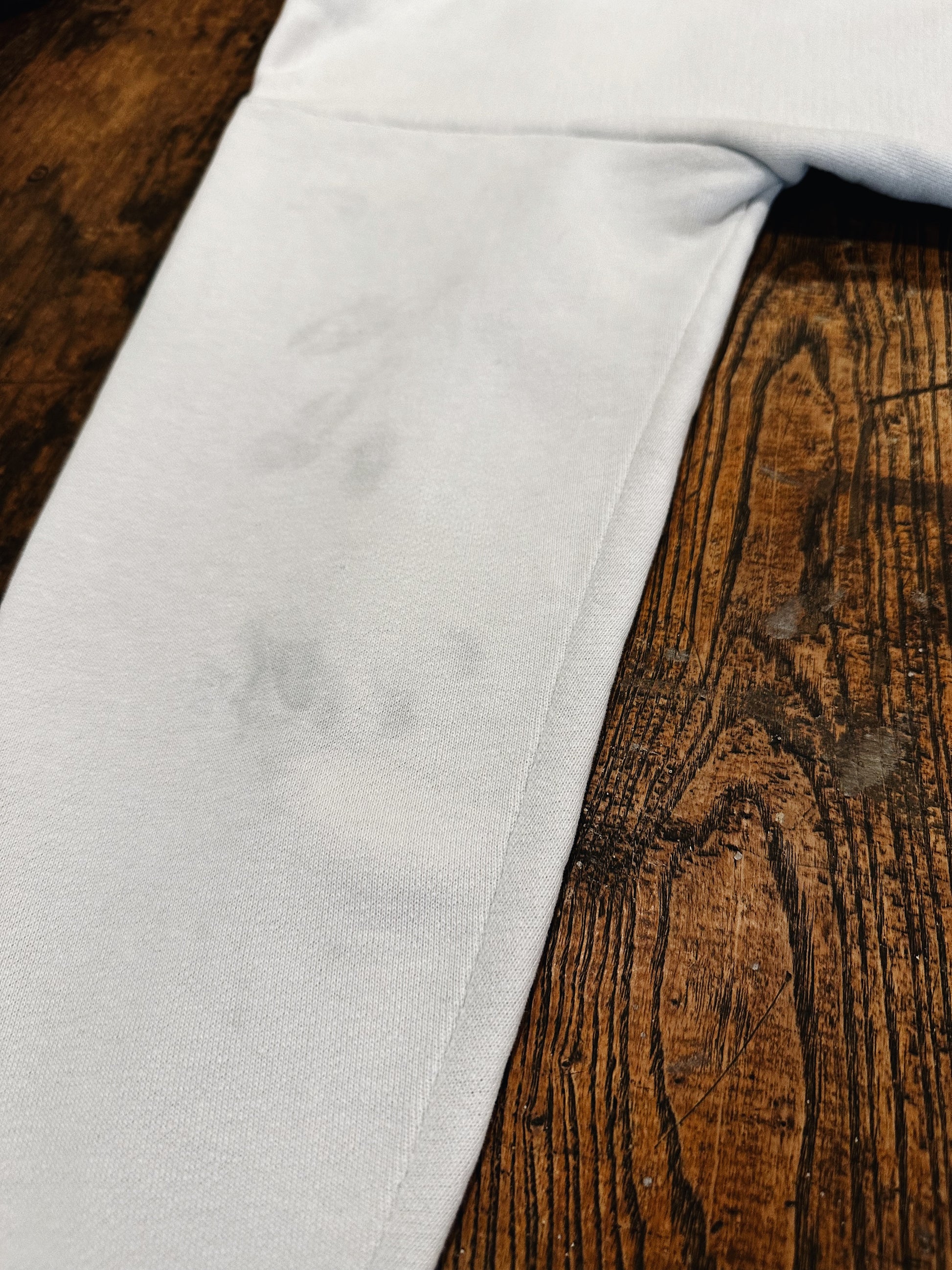 sweatshirt with some stains on sleeve 